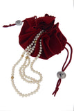 Serious Polka Dot Pearl Necklace - a three-row white fresh-water pearls necklace by Peregrina Pearls in branded packaging