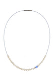 Abacus Pearl Necklace with a Tanzanite Bead by Peregrina Pearls - a lovely medium-length necklace with running pearls and a genuine tanzanite on a blue steel cord with a bayonet closure