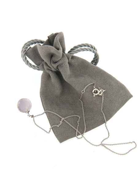 Rose Quartz Disco Ball Bubble Pendant on its soft pouch