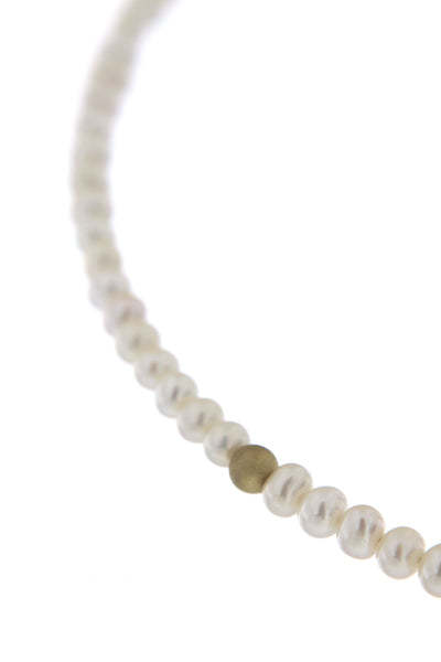 Abacus Pearl Necklace with Gold Bead by Peregrina Pearls - a close-up demonstrating textured 14 Kt yellow gold bead