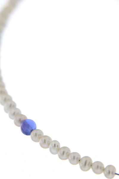 Abacus Pearl Necklace with a Tanzanite Bead - a close-up demonstrating gorgeous clear tanzanite bead