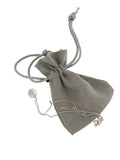 Praseolite Disco Ball Bubble Pendant on its soft pouch